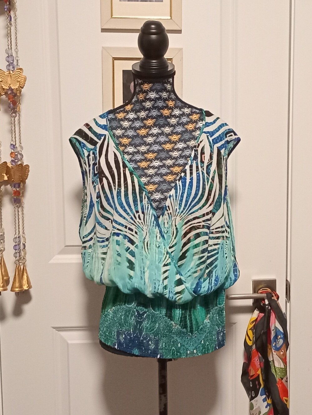 Blue and white abstract aquatic print Bebe top